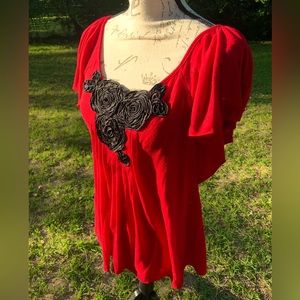 Embroidered roses on red flutter sleeve blouse
